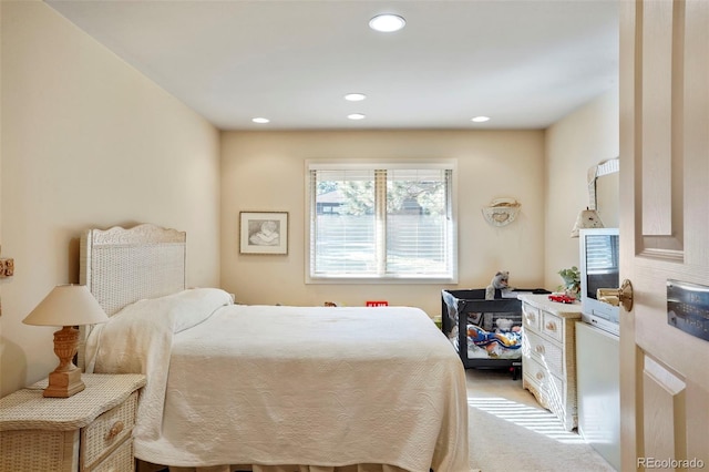 bedroom with light carpet