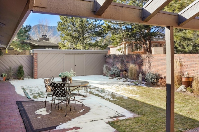 view of patio featuring a mountain view