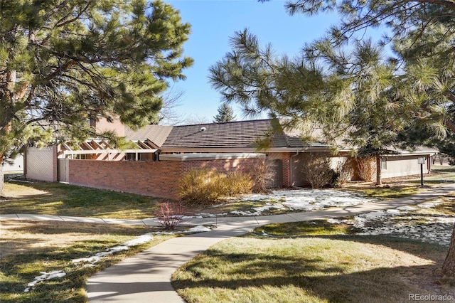 view of front of house with a front lawn