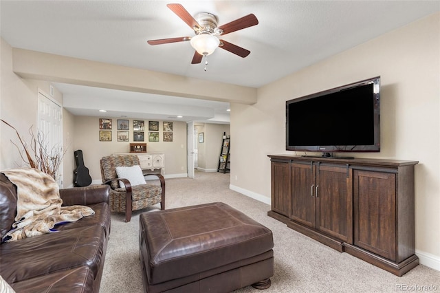 living area featuring light colored carpet, a ceiling fan, baseboards, and recessed lighting