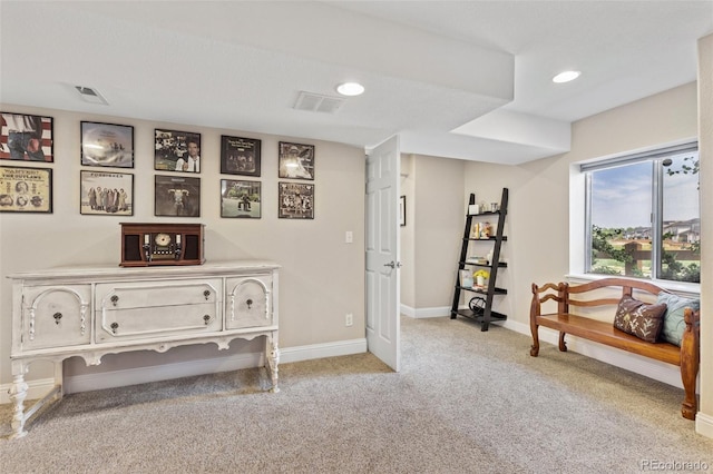 bedroom featuring light colored carpet, baseboards, and recessed lighting