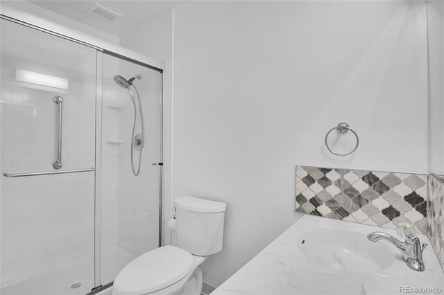 9655 E Center Ave Unit 9D, Denver, CO 80247 - bathroom with a stall shower and vanity