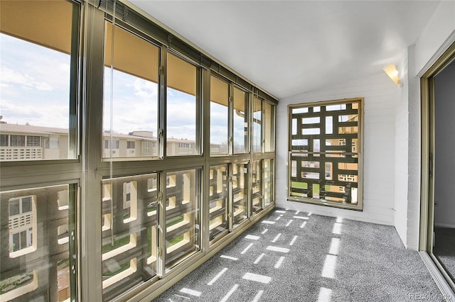 9655 E Center Ave Unit 9D, Denver, CO 80247 - unfurnished sunroom with lofted ceiling