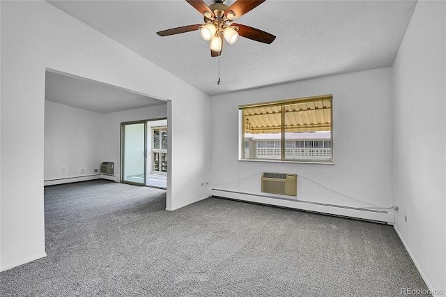 9655 E Center Ave Unit 9D, Denver, CO 80247 - carpeted empty room with a baseboard heating unit, ceiling fan, an AC wall unit, and lofted ceiling
