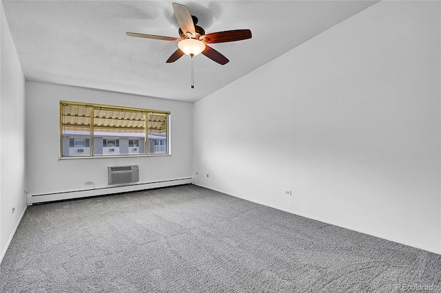 9655 E Center Ave Unit 9D, Denver, CO 80247 - spare room featuring carpet flooring, a wall mounted air conditioner, a ceiling fan, and a baseboard heating unit