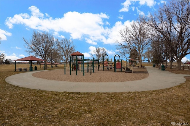 view of playground with a gazebo and a lawn