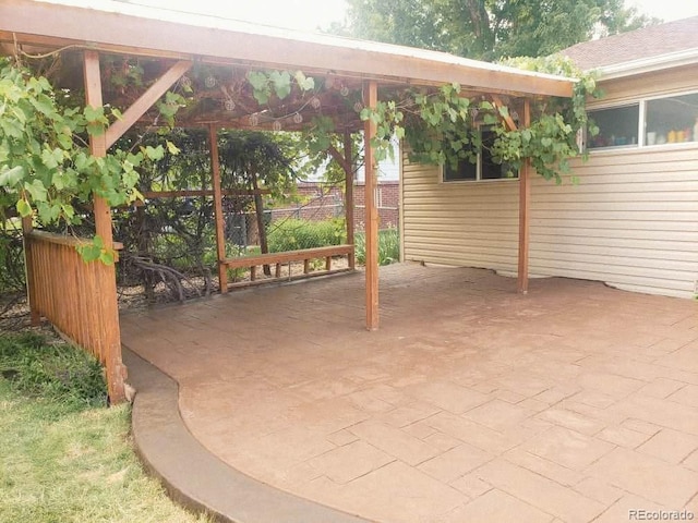 view of patio / terrace with fence