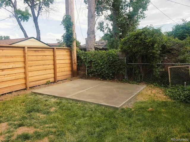 exterior space with a fenced backyard