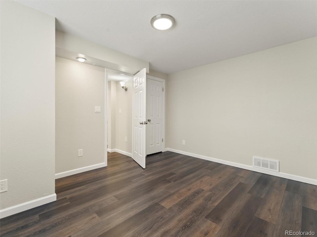 16986 E Piedmont Dr Unit A, Aurora, CO 80015 - unfurnished room with baseboards and dark wood-type flooring