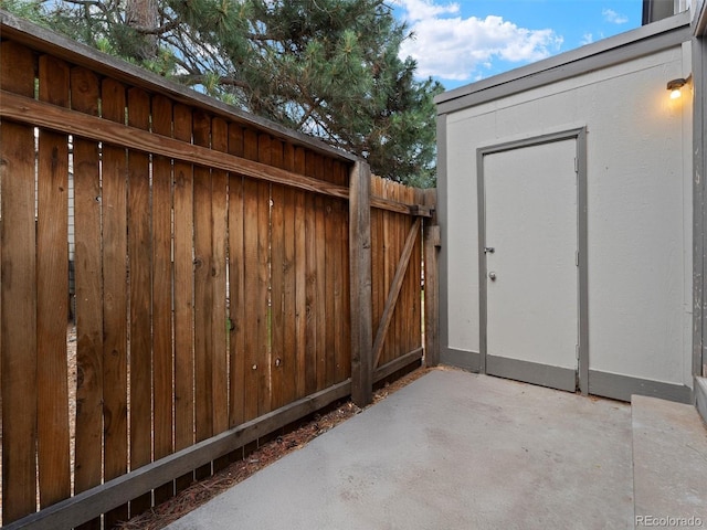16986 E Piedmont Dr Unit A, Aurora, CO 80015 - view of patio / terrace featuring a storage shed