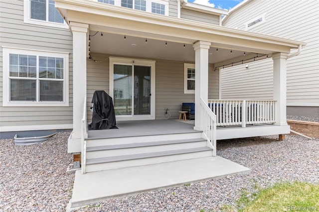 entrance to property with a porch
