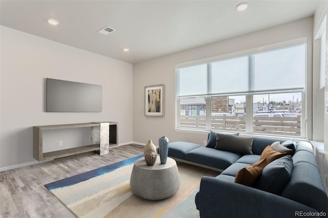 9457 W 58th Ln Unit A, Arvada, CO 80002 - living area featuring wood finished floors and recessed lighting