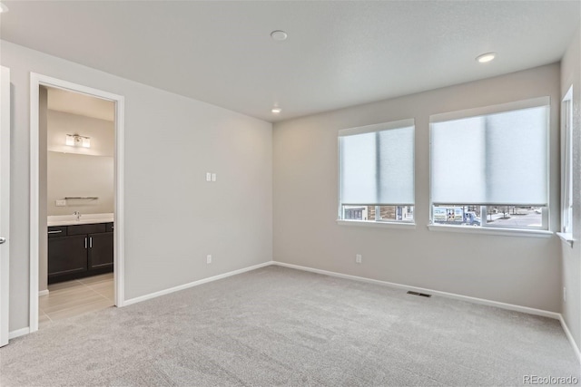 9457 W 58th Ln Unit A, Arvada, CO 80002 - spare room with light carpet and recessed lighting