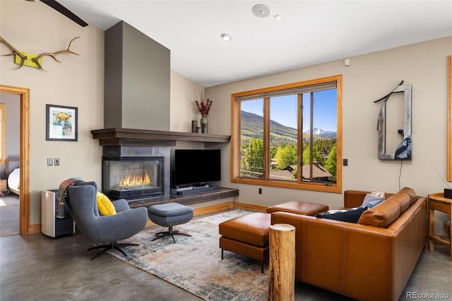 222 Idlewild Dr, Dillon, CO 80435 - living area with a glass covered fireplace and concrete floors