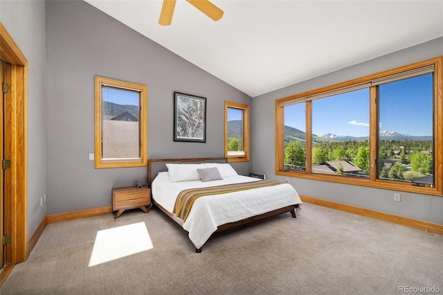 222 Idlewild Dr, Dillon, CO 80435 - carpeted bedroom with lofted ceiling, a mountain view, and a ceiling fan