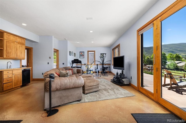 222 Idlewild Dr, Dillon, CO 80435 - living area featuring healthy amount of natural light, light colored carpet, and recessed lighting