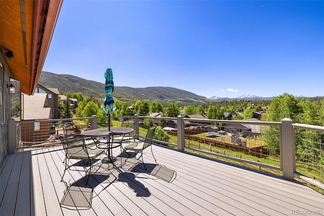 222 Idlewild Dr, Dillon, CO 80435 - deck featuring a mountain view and outdoor dining area