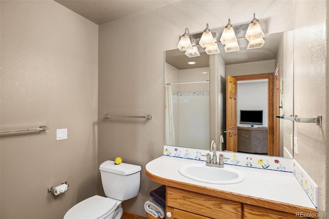 222 Idlewild Dr, Dillon, CO 80435 - full bath with vanity, a tile shower, and a textured wall