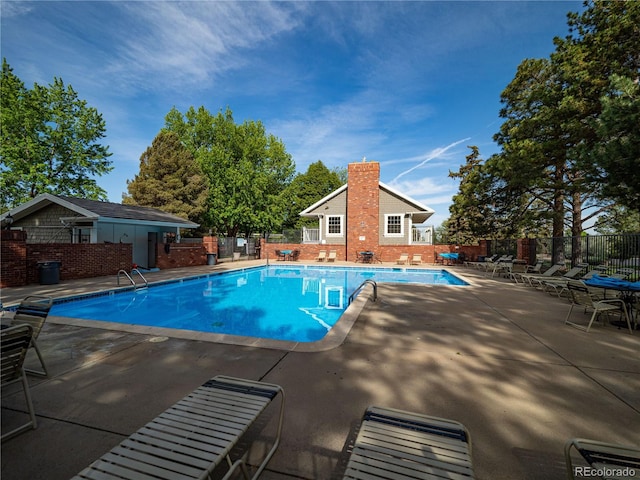 15395 E Penwood Pl, Aurora, CO 80015 - community pool featuring a patio