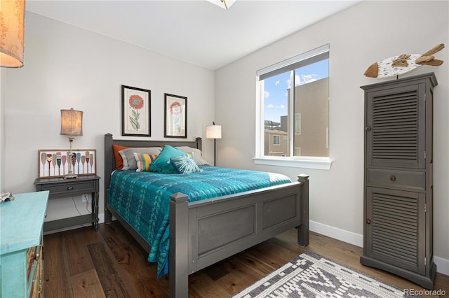 bedroom featuring dark hardwood / wood-style floors