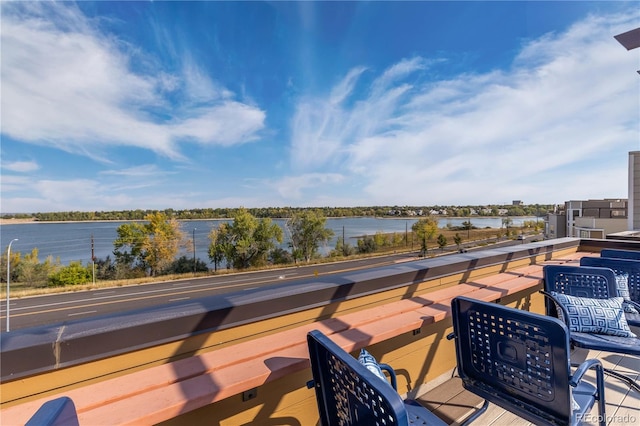 deck featuring a water view