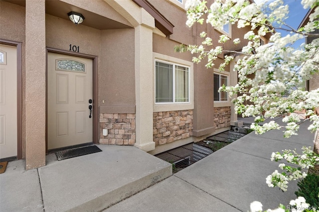 1510 York Rd Unit 101, Colorado Springs, CO 80918 - view of exterior entry with stone siding and stucco siding