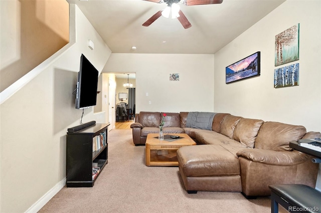1510 York Rd Unit 101, Colorado Springs, CO 80918 - living room featuring light colored carpet, a ceiling fan, a chandelier, and baseboards
