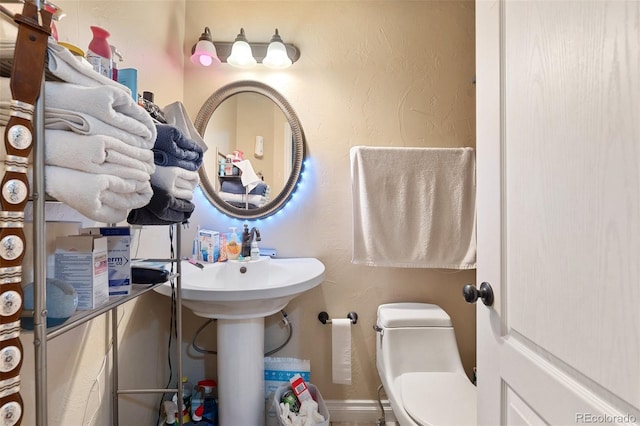 1510 York Rd Unit 101, Colorado Springs, CO 80918 - bathroom with toilet and a textured wall