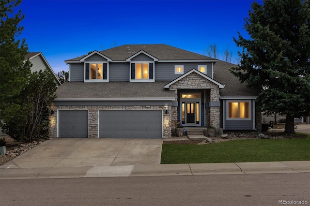 598 Stonemont Dr, Castle Pines, CO 80108 - view of front of house with concrete driveway, an attached garage, stone siding, and a shingled roof
