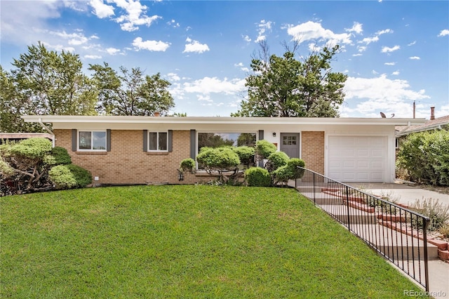 1948 S Zenobia St, Denver, CO 80219 - single story home featuring brick siding, an attached garage, concrete driveway, and a front lawn