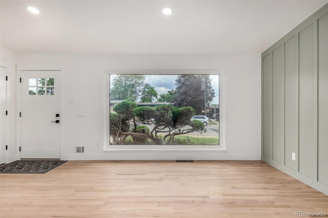 1948 S Zenobia St, Denver, CO 80219 - foyer entrance featuring light wood-type flooring and recessed lighting