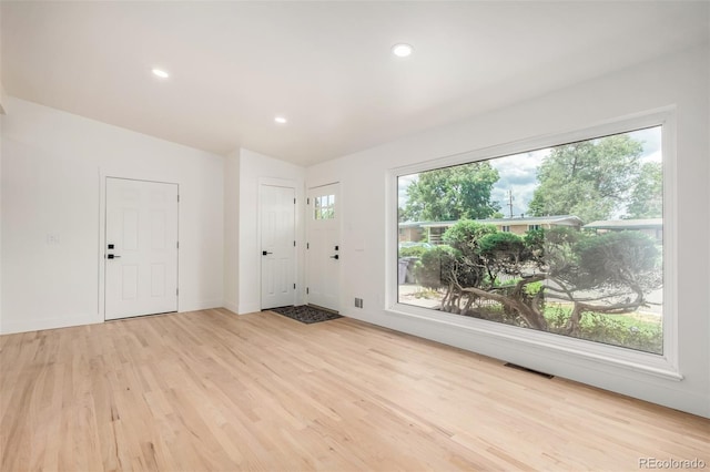 1948 S Zenobia St, Denver, CO 80219 - foyer entrance featuring wood finished floors, recessed lighting, and vaulted ceiling