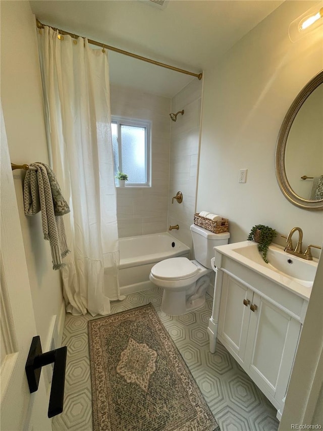 1948 S Zenobia St, Denver, CO 80219 - bathroom with shower / bath combination with curtain, vanity, and tile patterned flooring