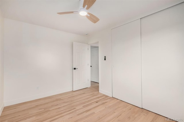 1948 S Zenobia St, Denver, CO 80219 - unfurnished bedroom with light wood-style floors, a closet, and a ceiling fan