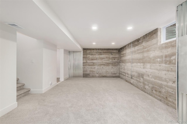 1948 S Zenobia St, Denver, CO 80219 - finished basement featuring carpet flooring, recessed lighting, stairway, and wooden walls