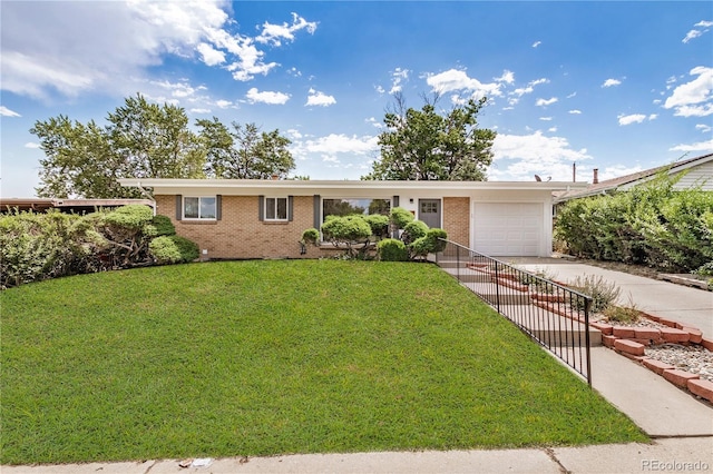 1948 S Zenobia St, Denver, CO 80219 - ranch-style home featuring brick siding, driveway, a garage, and a front yard