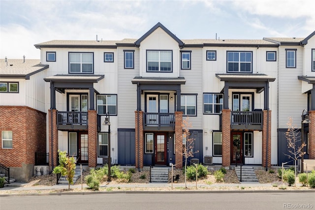 9490 W 14th Ave Unit 3, Lakewood, CO 80215 - townhome / multi-family property with board and batten siding
