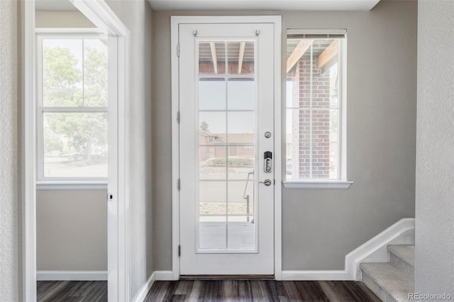 9490 W 14th Ave Unit 3, Lakewood, CO 80215 - entryway with dark wood-style floors, plenty of natural light, baseboards, and stairs