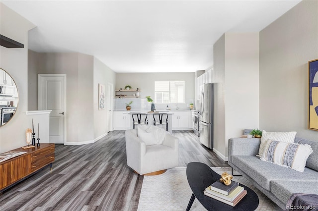 9490 W 14th Ave Unit 3, Lakewood, CO 80215 - living area featuring wood finished floors and baseboards