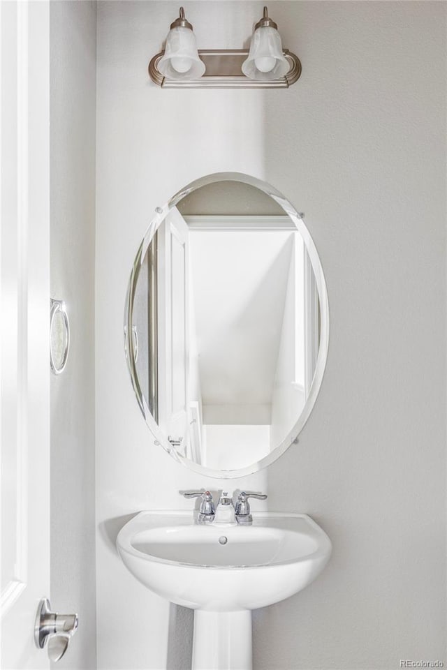 9490 W 14th Ave Unit 3, Lakewood, CO 80215 - bathroom featuring a sink
