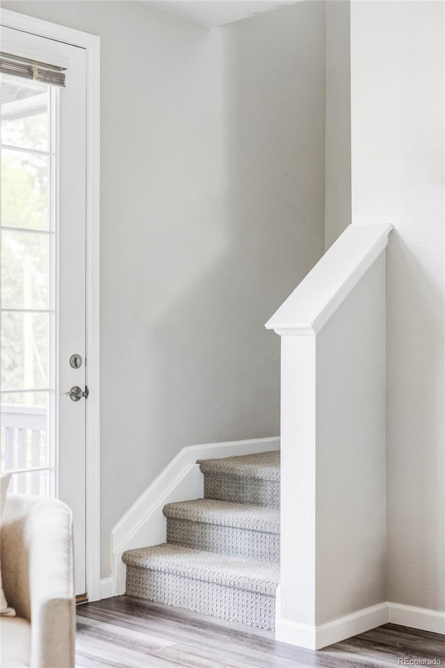 9490 W 14th Ave Unit 3, Lakewood, CO 80215 - stairway featuring wood finished floors and baseboards