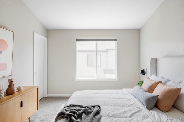 9490 W 14th Ave Unit 3, Lakewood, CO 80215 - bedroom featuring light carpet and baseboards