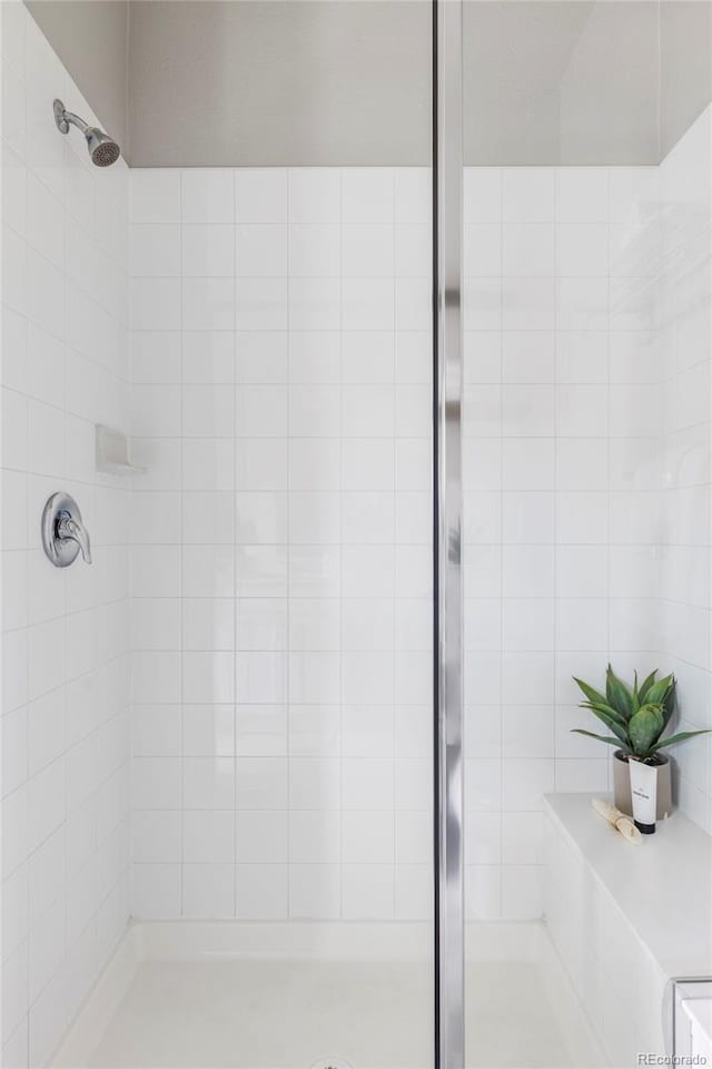 9490 W 14th Ave Unit 3, Lakewood, CO 80215 - full bathroom featuring a shower stall