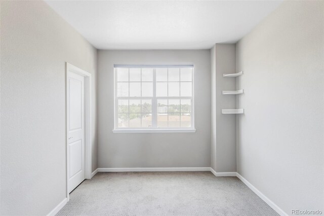 9490 W 14th Ave Unit 3, Lakewood, CO 80215 - unfurnished bedroom with light carpet and baseboards