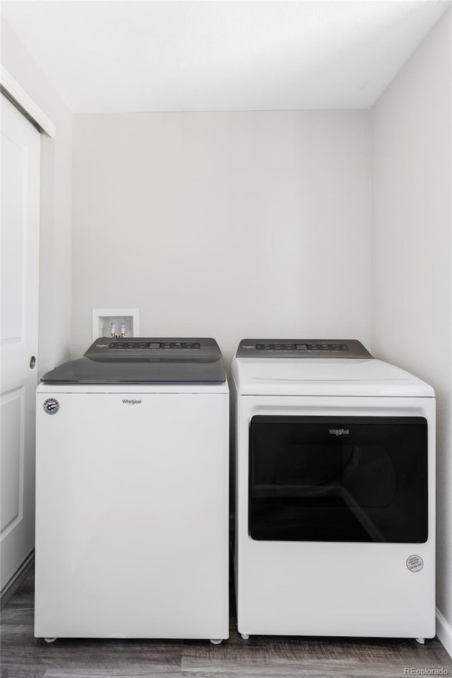 9490 W 14th Ave Unit 3, Lakewood, CO 80215 - laundry area featuring washer and dryer and wood finished floors