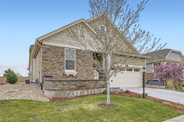 15211 Quince St, Thornton, CO 80602 - view of front of home featuring stone siding, concrete driveway, an attached garage, a front lawn, and central air condition unit