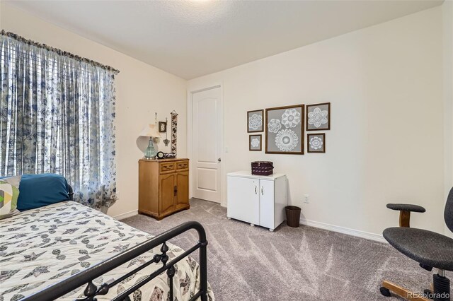 15211 Quince St, Thornton, CO 80602 - bedroom with light carpet and baseboards