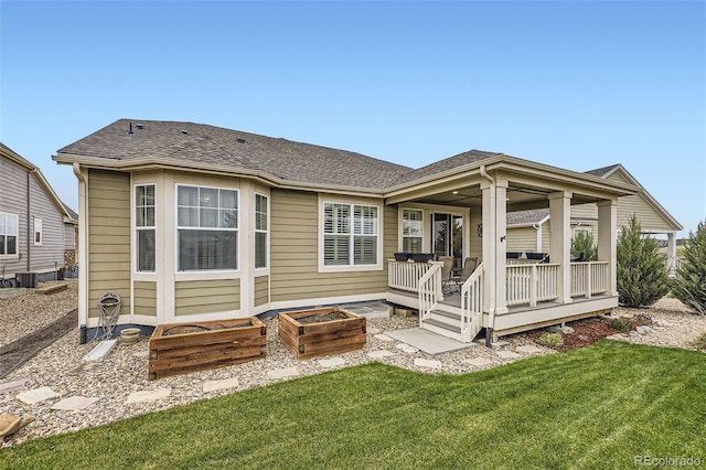 15211 Quince St, Thornton, CO 80602 - rear view of property featuring a lawn and a shingled roof