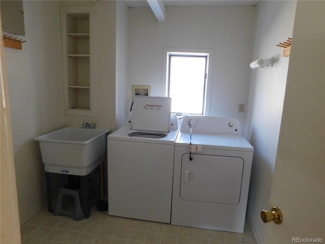 11003 US Highway 160, Del Norte, CO 81132 - washroom featuring separate washer and dryer and light flooring