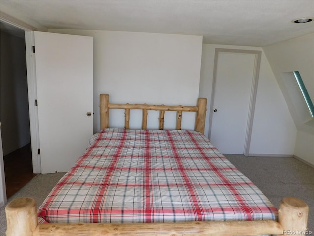 11003 US Highway 160, Del Norte, CO 81132 - carpeted bedroom with vaulted ceiling